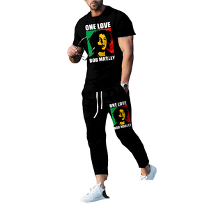model wearing Powque urban Style One love Bob marley black T-shirt and matching jogger pants on a white background