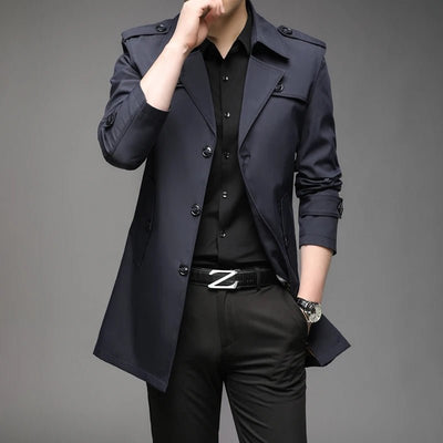 POWQUE URBAN STYLE men's long trench coat in dark navy worn with black shirt and pants