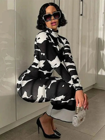 POWQUE URBAN STYLE black and white polo neck slimming dress for women with abstract pattern and long sleeves