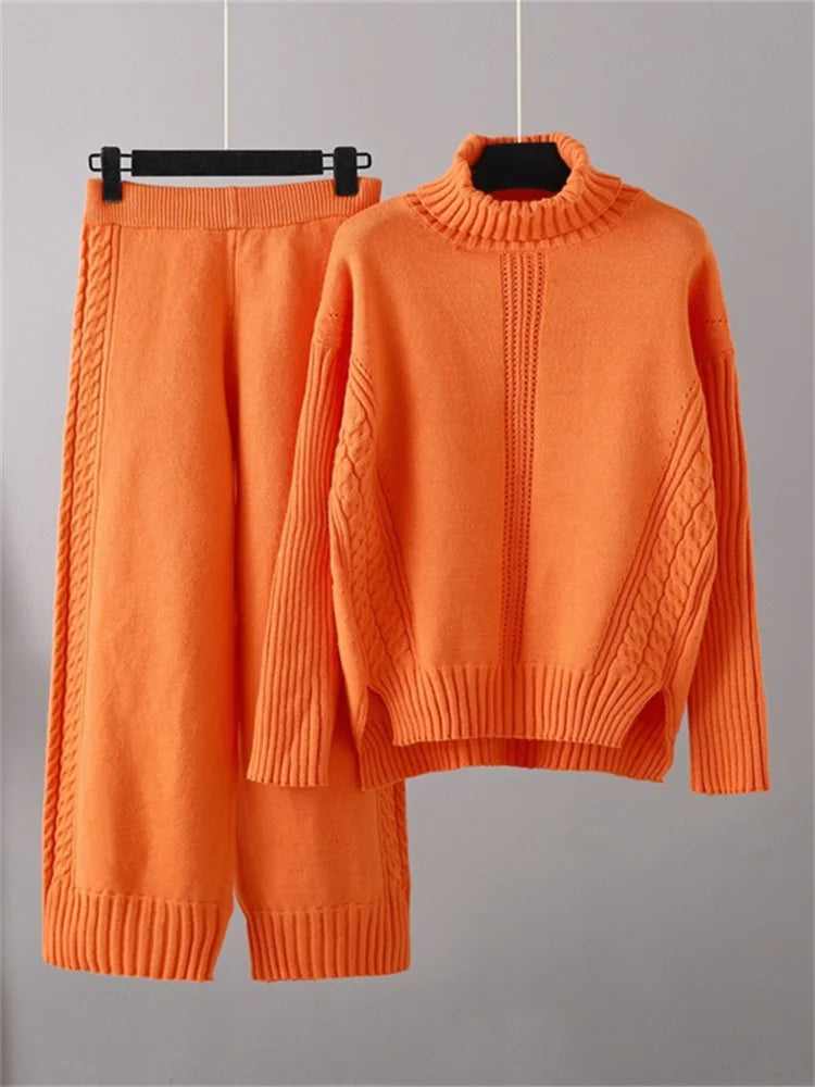POWQUE URBAN STYLE women's knitted turtleneck tracksuit set in bright orange with cable knit details